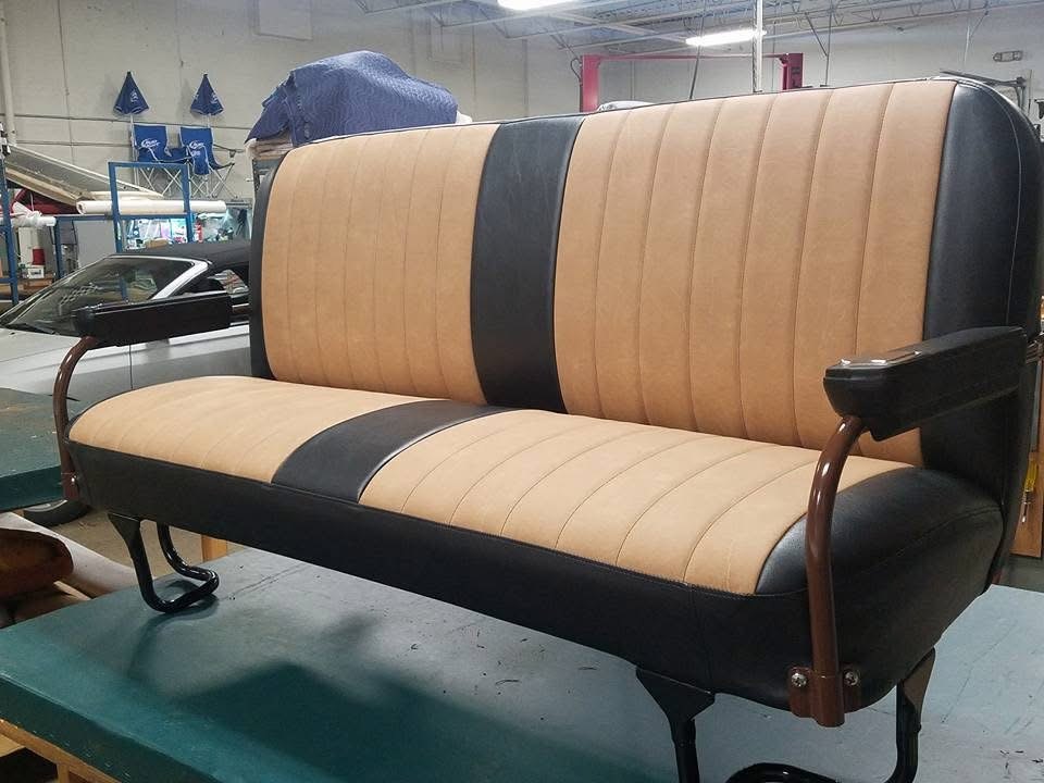 Finished tan and black custom bench seat with armrests